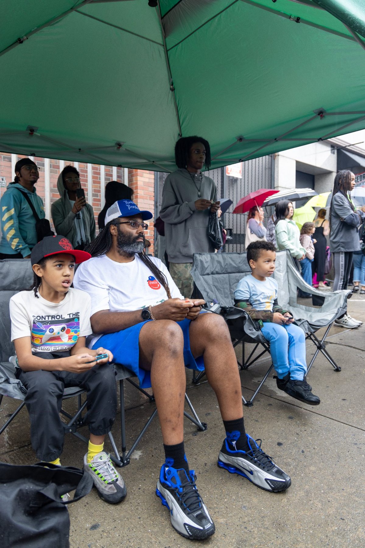 Family enjoying gaming under the canopy setup