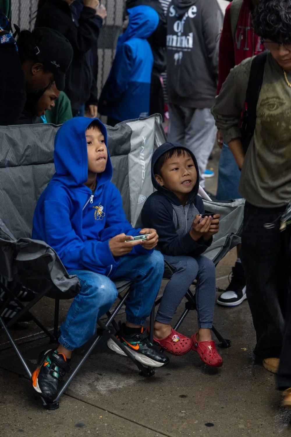 Kids gaming party NYC holding game controllers